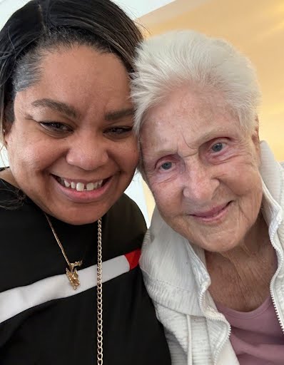 Kanika visiting an older woman